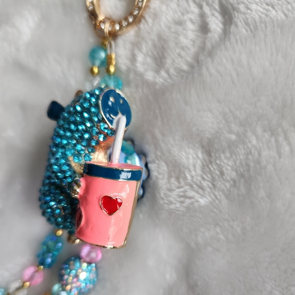 Colorful Capybara Beaded Bag Charm with Blue and Gold Accents - Picture 3 of 7